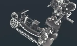 Mechanizm silnika z widocznym tłokiem, zaworami i łańcuchem napędowym. To serce maszyny, jej rozrząd królewski.